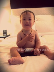 Learning a new sign: Please.  As in, "Please let me throw the remote control off the bed approximately 245,657 times in a row."